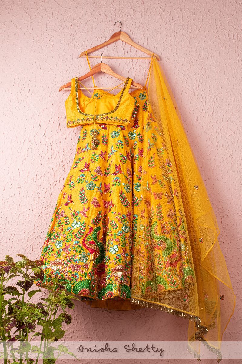 MUSTARD YELLOW FLORAL FLAMINGO BRIDAL BEAUTY LEHENGA SET