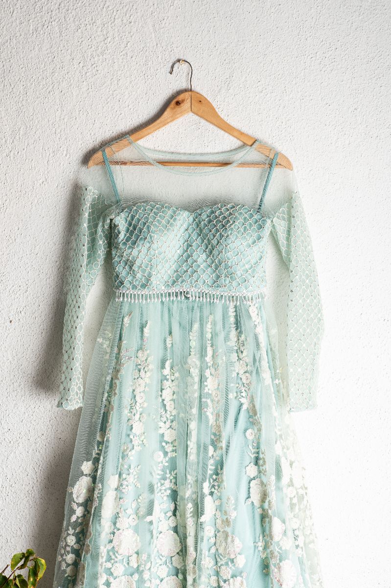 LIGHT TEAL BLUE BLOUSE WITH LIGHT TEAL BLUE & OFFWHITE THREADWORK LEHENGA SET