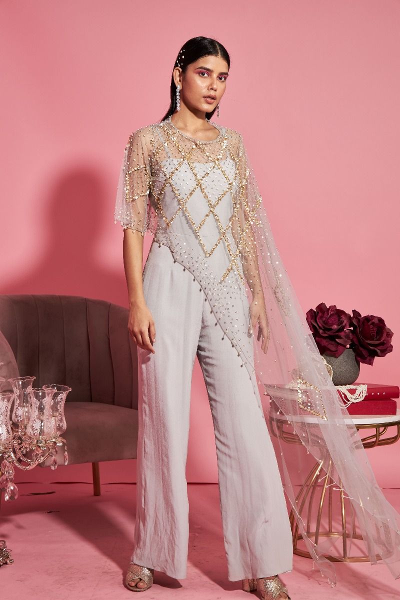 GREY JUMPSUIT WITH ASYMMETRICAL CAPE