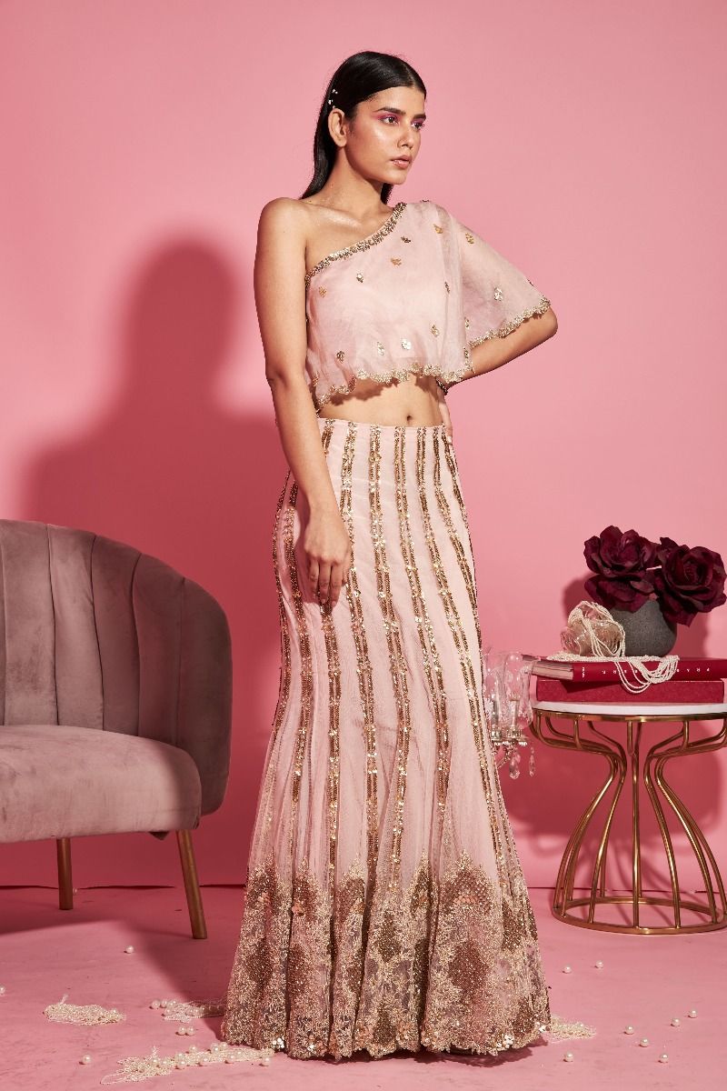 NUDE PINK MERMAID LEHENGA AND ONE SHOULDER CAPE TOP